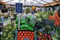 Fruit and vegetables shoppers at fruit and vegetables vendor