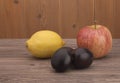 Fruit on a wooden background Royalty Free Stock Photo