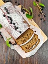 Fruitcake bird cherry cut on board top Royalty Free Stock Photo