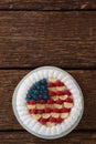 Fruitcake served in plate on wooden table Royalty Free Stock Photo