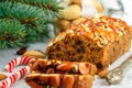 Fruitcake. Traditional Christmas cake with almonds, dried cranberries, cinnamon, cardamom