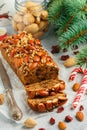 Fruitcake. Traditional Christmas cake with almonds, dried cranberries, cinnamon, cardamom