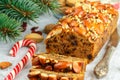 Fruitcake. Traditional Christmas cake with almonds, dried cranberries, cinnamon, cardamom