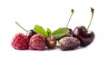 Fruits and berries isolated on white background. Ripe raspberries, cherries, gooseberries, and mulberries. Background of mix fruit Royalty Free Stock Photo