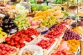 Fruits, berries and vegetables on the counter at the street market