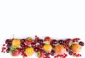 Fruits and berries on white background. Sweet and juicy fruits at border of image with copy space for text. Ripe apricots, currant Royalty Free Stock Photo