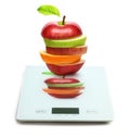 Fruits on digital weight scale Royalty Free Stock Photo