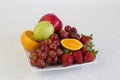 Fruits on dish dispay on the kitchen floor Royalty Free Stock Photo