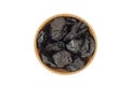 Fruits dried prunes in a wooden bowl Royalty Free Stock Photo