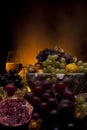 Fruits with glass of white wine