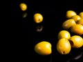 Fruits of green olives berries on a black background Royalty Free Stock Photo