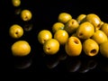 Fruits of green olives berries on a black background Royalty Free Stock Photo