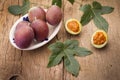 Fruits of gulupa on vine wood table Royalty Free Stock Photo