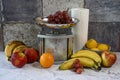 Fruits on a kitchen countertop near a kitchen scale Royalty Free Stock Photo