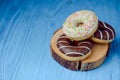 fruits lying on the table againts donuts Royalty Free Stock Photo