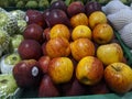 fruits are neatly arranged on displays in supermarkets so that buyers can immediately see and select them to buy