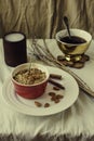 Fruits and nuts crumble pie in a red portion form. Dessert with fruits, oatmeal and almonds. Insta-size. Healthy autumn morning