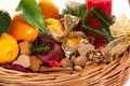 Fruits, nuts and gingerbreads in basket