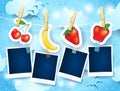 Fruits and photo frames on sky background Royalty Free Stock Photo