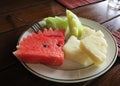 Fruits plate with sliced melon,watermelon and pineapple Royalty Free Stock Photo