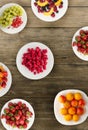 Fruits on a plate. vegetarian food on wooden background. vegan food top view