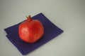 Grenades. Ripe fruit on a white background. Red grenade.