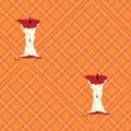 Big apple cores on orange background