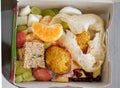 fruits and sweets, prasad from worship in a box