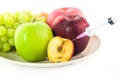 Fruits and syring on white background