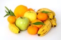 Fruits tangerines  apples and bananas on a white background Royalty Free Stock Photo