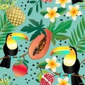 Tropical fruits, flowers and toucans. Exotic seamless pattern on a blue background. Cute plumeria flowers with palm leaves Royalty Free Stock Photo