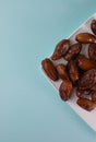 fruits of a tropical date tree ripe sweet fragrant colorful dates of different varieties and like dried fruits Royalty Free Stock Photo