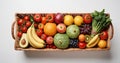 Fruits and vegetables in a basket on a white background, top view Royalty Free Stock Photo