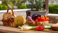 Fruits, vegetables and bread on the table in the summer garden