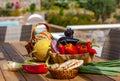 Fruits, vegetables and bread on the table in the summer garden Royalty Free Stock Photo