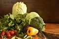 Fruits and vegetables like tomatoes, yellow bell pepper, broccoli, parsley arranged in a group, natural still life for healthy Royalty Free Stock Photo