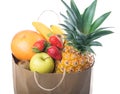 Fruits and vegetables in paper grocery bag isolated over white Royalty Free Stock Photo