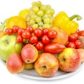 Fruits and vegetables on a platter isolated on white background Royalty Free Stock Photo