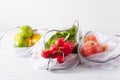Fruits and vegetables in reusable mesh nylon bag, plastic free zero waste concept