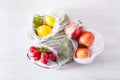 Fruits and vegetables in reusable mesh nylon bag, plastic free zero waste concept