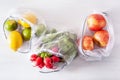 Fruits and vegetables in reusable mesh nylon bag, plastic free zero waste concept Royalty Free Stock Photo