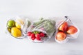 Fruits and vegetables in reusable mesh nylon bag, plastic free zero waste concept Royalty Free Stock Photo