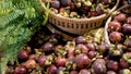 Fruits and vegetables on rustic stall. Assorted fresh ripe fruits and vegetables placed on rustic oriental stall in market. sweet