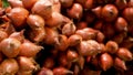 Fruits and vegetables on rustic stall. Assorted fresh ripe fruits and vegetables placed on rustic oriental stall in market. Red