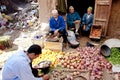 Fruits and vegetables seller directly beside garbadge dump, Morocco