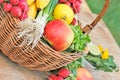 Fruits and vegetables in wicker basket Royalty Free Stock Photo