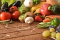 Fruits and vegetables on wood table front close up Royalty Free Stock Photo
