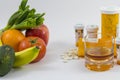 Fruits and veggies and Alcohol and pills Royalty Free Stock Photo