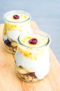 Fruits yogurt with oatmeal in jar