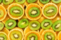 Fruity background set of slices of orange fruit and kiwi.